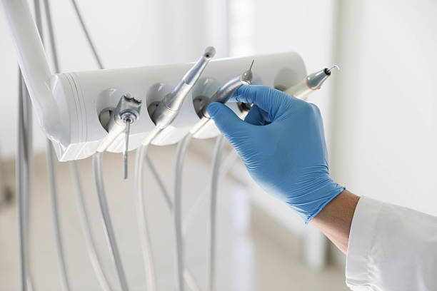 Professional Root Canal Treatment technician working in Highland Village, TX